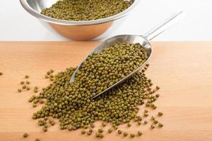 Mung beans in bowl with transfer scoop