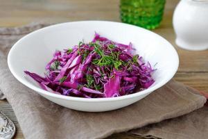 Homemade salad with cabbage in a bowl photo