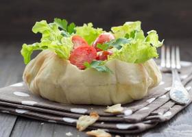 Salad in a bread bowl photo