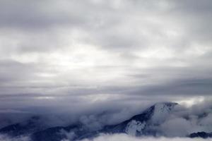 Winter mountains covered with clouds