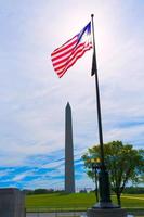 Washington Monument and american flags photo