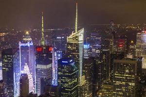 Resumen de Manhattan en la noche del Empire State Building