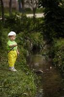 photo of little boy fishing