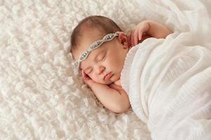 Portrait of an Angelic Newborn Girl photo