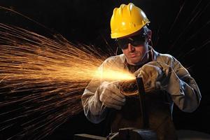 Workman in black background with sparkle photo