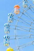 Amusement ferris wheel in the park photo