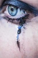 woman cries, close-up photo