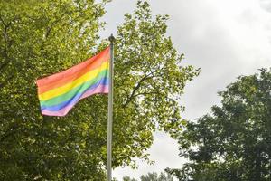 LGBT flag in front of coffee place in the park
