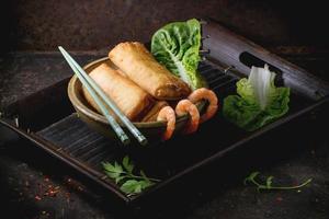 Spring rolls with vegetables and shrimps photo