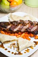 Duck (goose) breast with buckwheat dumplings and carrot photo