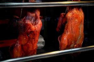 Duck roast hanging cupboard glass.