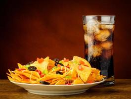 nachos and cola drink photo
