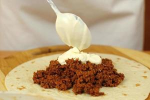 Adding tablespoon of sour cream into stuffing (ground beef) photo