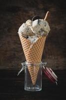 Ice cream with cookies in cone photo