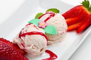 Strawberry ice cream with fruits close up photo