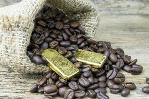 Coffee beans and Gold Bullion in sackcloth bag