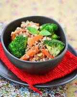 buckwheat groat with carrot bacon, and broccoli photo