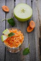 Salad from carrot, apples and yoghurt. photo