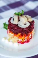 Russian traditional herring salad photo