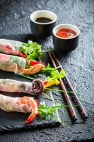 Enjoy your spring rolls with vegetables and seafood photo
