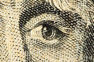 Eye on a banknote of dollar USA, Macro photo