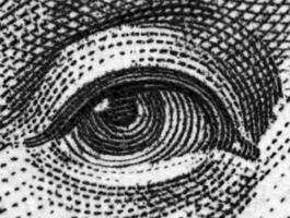 Black and white, Dollar USA, eye. Extreme closeup.Macro photo