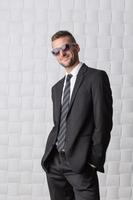 Businessman in sunglasses photo