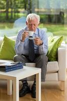 Senior businessman drinking coffee