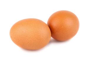 par de huevos de gallina marrón foto