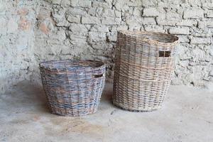 Two wattled baskets of bronze century