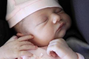 Sleeping newborn baby photo