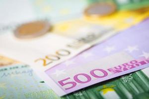 Closeup of euro banknotes and coins photo