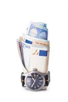 Time is money, watch and banknotes