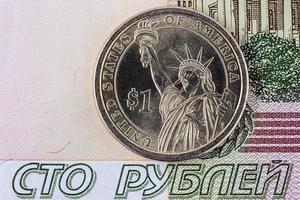 One dollar and one hundred rubles photo