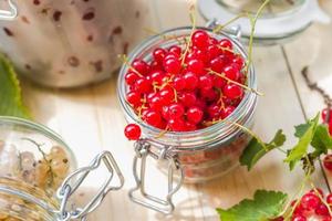 Preparation products processed fresh colorful summer fruits jars photo