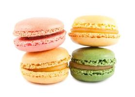Four colorful french macaroons