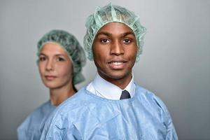 Confident Medical Professionals in surgery gown photo
