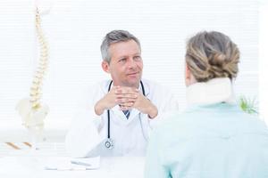 Doctor having conversation with his patient