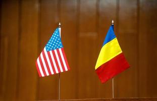 American and romanian table flags