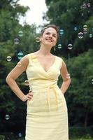 Woman with soap bubbles photo