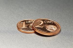 3 Euro Cents on a shiny alloy board