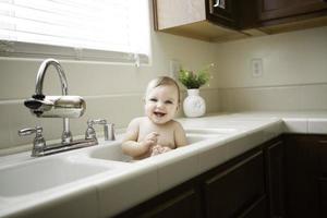 Baby in Kitchen Sink photo