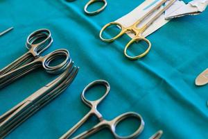 Surgery tools on blue