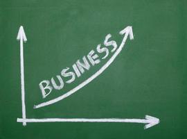 finance business graph on chalkboard economy