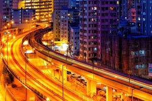 busy highway train traffic night in finance urban