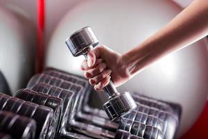 Gym equipment. Sport background. Dumbbell. Copy space photo
