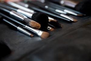 Brushes for make up on leather background