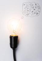 Light bulb with drawing graph photo