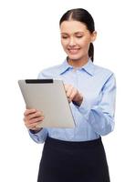 smiling businesswoman with tablet computer