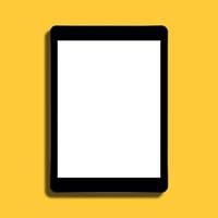 Tablet computer on yellow background